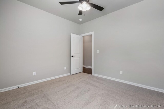 2787 Forest View Dr, Claremore, OK 74017 - empty room featuring a ceiling fan, carpet, and baseboards
