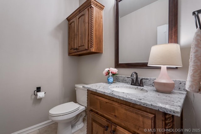 2787 Forest View Dr, Claremore, OK 74017 - half bathroom featuring vanity, toilet, tile patterned floors, and baseboards