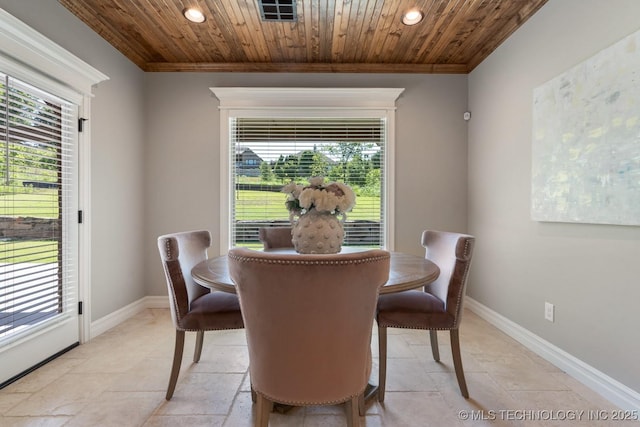2787 Forest View Dr, Claremore, OK 74017 - dining area with crown molding, wood ceiling, recessed lighting, baseboards, and stone tile flooring