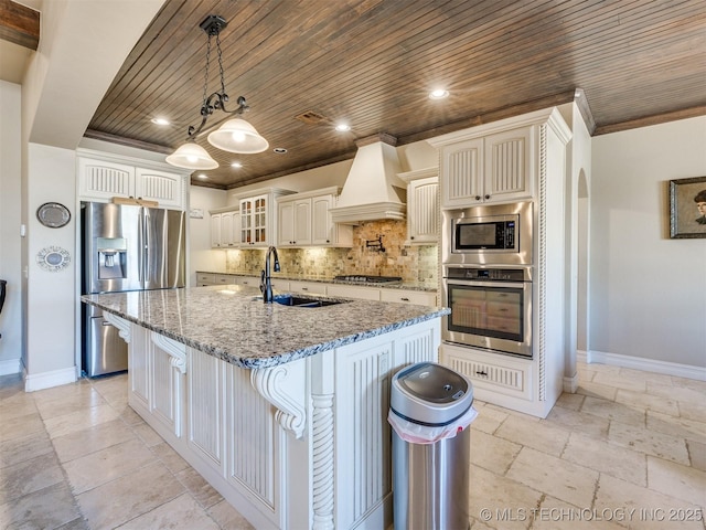 kitchen featuring a kitchen island with sink, wooden ceiling, custom range hood, and appliances with stainless steel finishes