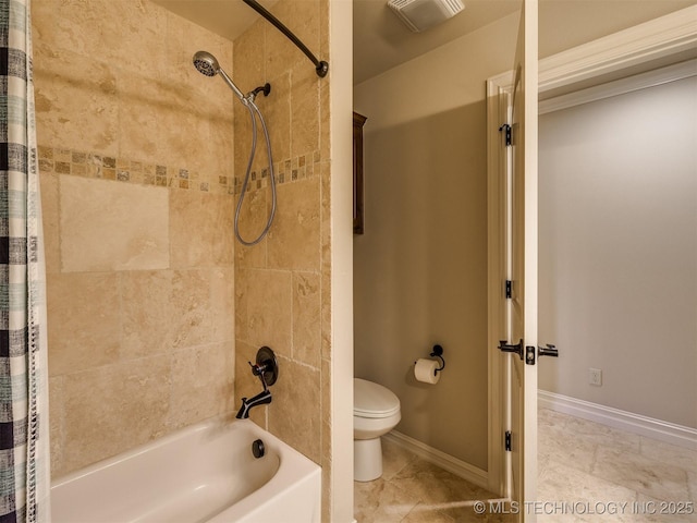 bathroom with shower / bathtub combination with curtain and toilet