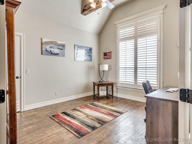 office area with ceiling fan, dark hardwood / wood-style floors, and lofted ceiling