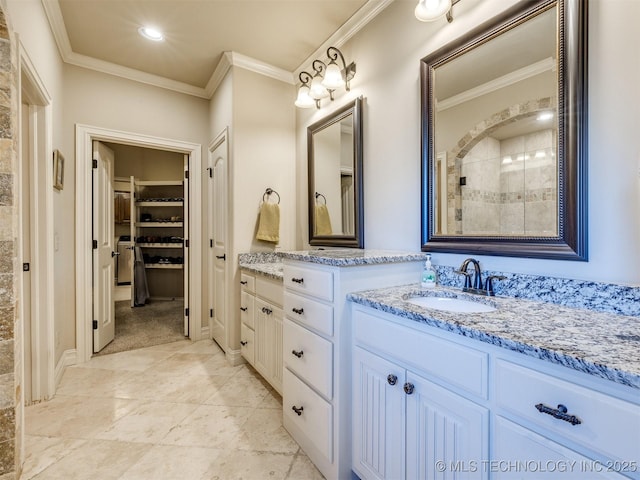 bathroom with vanity and crown molding