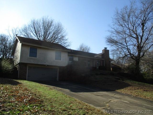 view of home's exterior featuring a garage