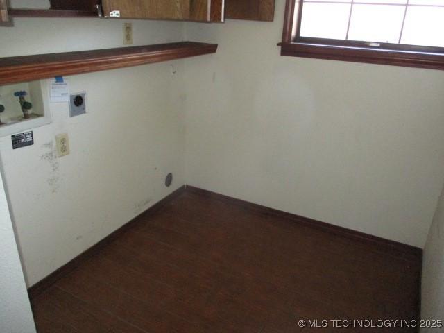 laundry area with electric dryer hookup and washer hookup