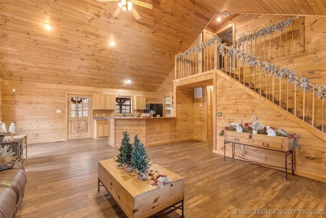 living room with wood walls, high vaulted ceiling, wood ceiling, and wood-type flooring