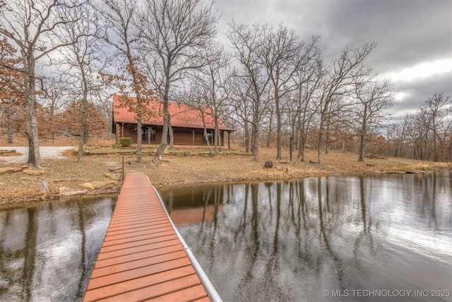 dock area featuring a water view