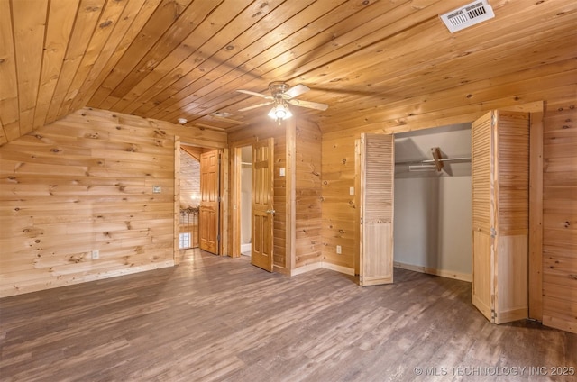 unfurnished bedroom featuring hardwood / wood-style flooring, ceiling fan, wooden ceiling, and lofted ceiling