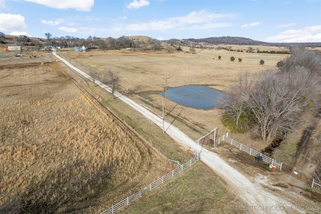 birds eye view of property featuring a rural view