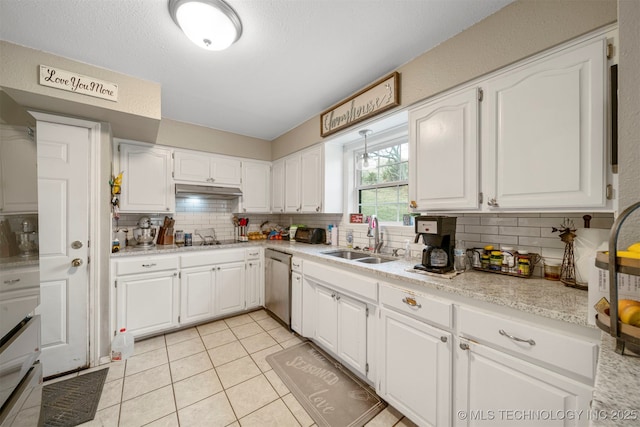 kitchen featuring stainless steel dishwasher, white cabinetry, and sink