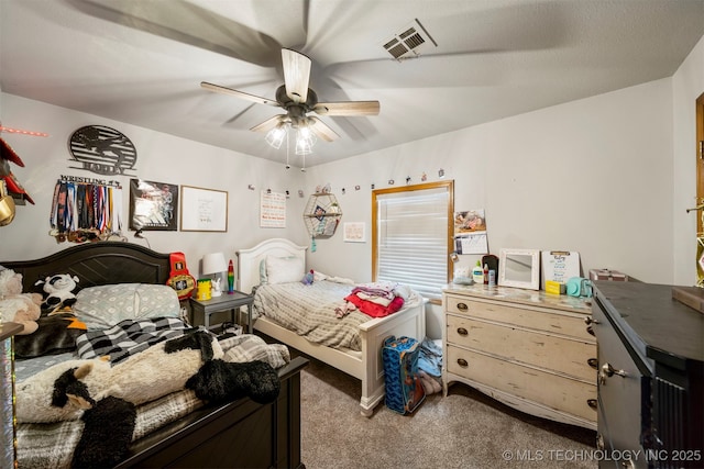 carpeted bedroom featuring ceiling fan