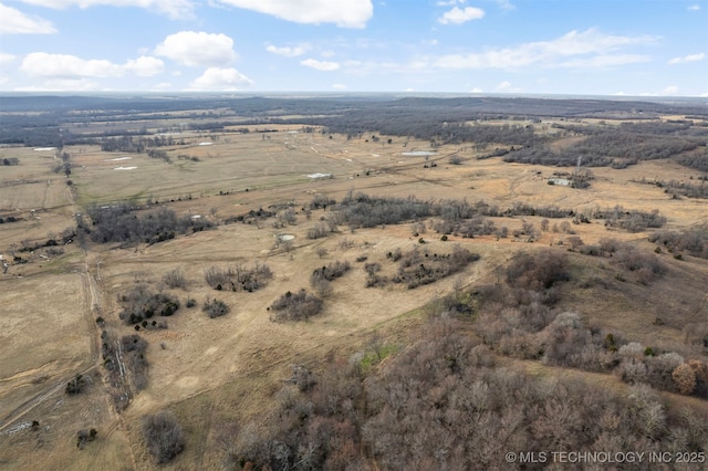 birds eye view of property featuring a rural view