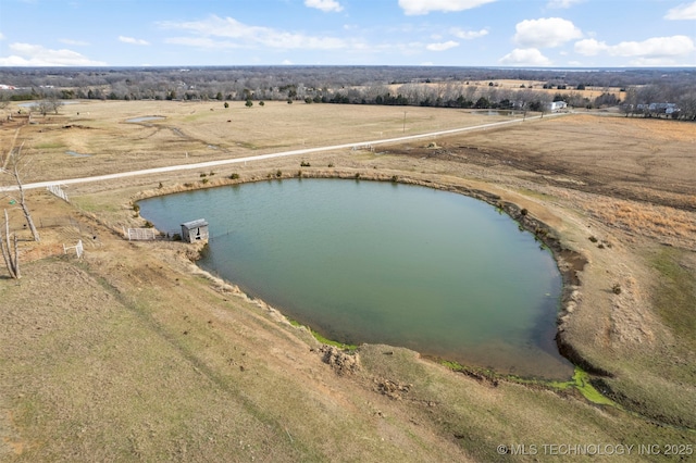 aerial view with a rural view and a water view