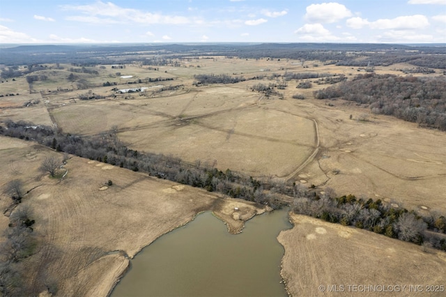 aerial view featuring a rural view and a water view