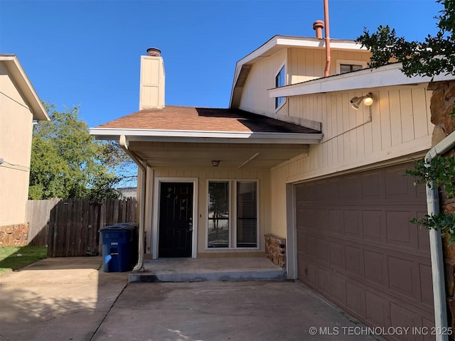 property entrance with a garage