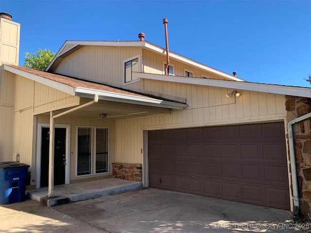 view of front of home featuring a garage