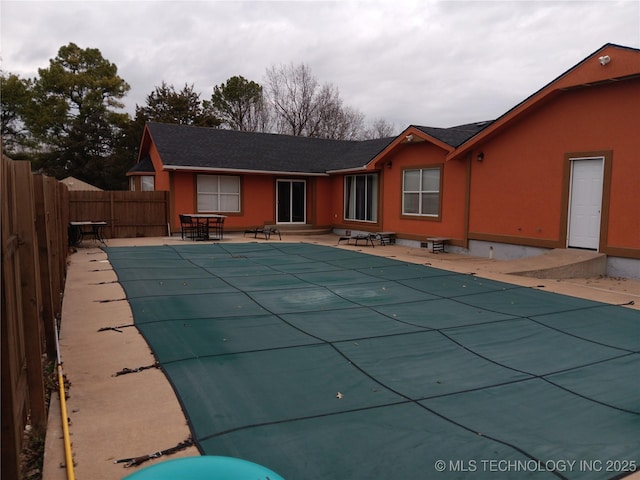 view of pool with a fenced in pool, a patio area, and a fenced backyard