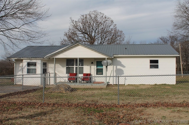 ranch-style house featuring a porch and a front lawn