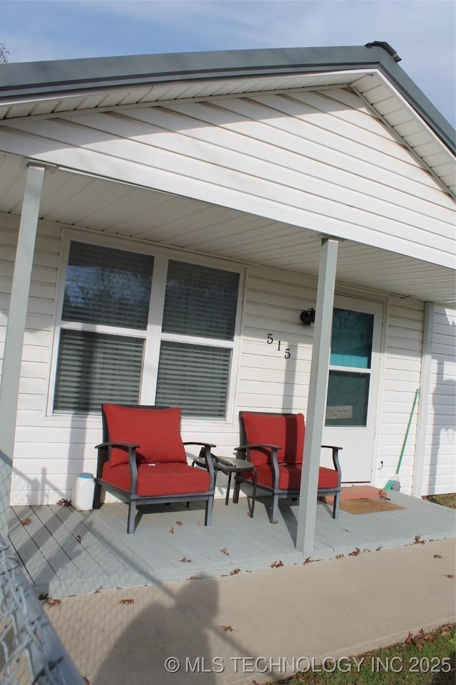 view of patio featuring a porch