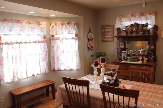 dining room featuring wood-type flooring