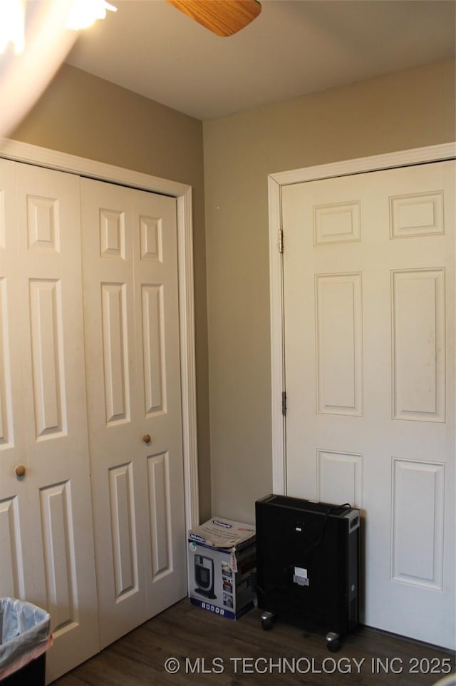 interior space with dark hardwood / wood-style flooring