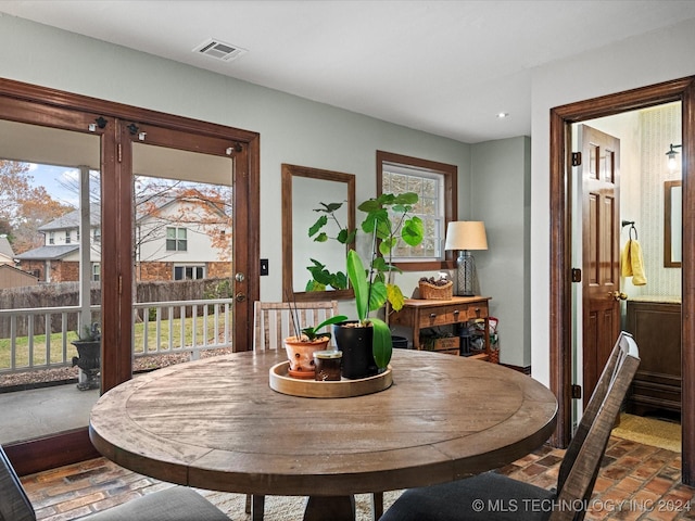 dining space with a healthy amount of sunlight