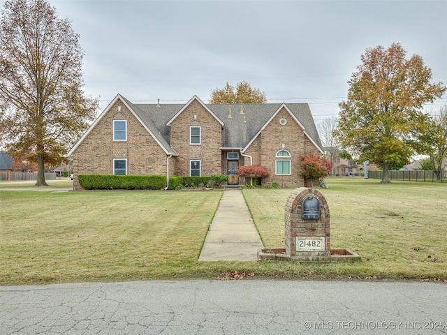 view of front of property with a front lawn