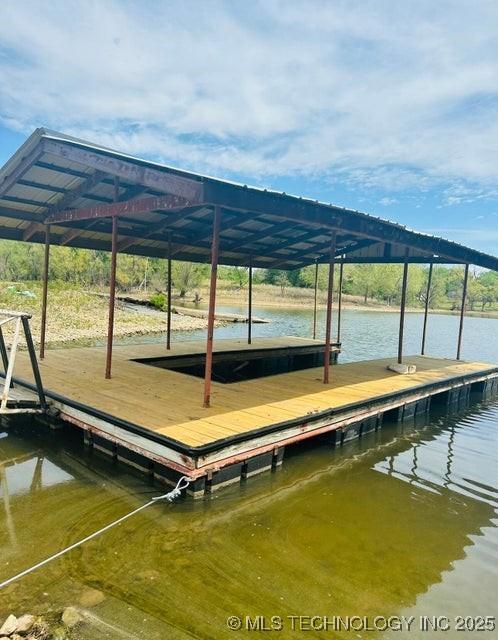 view of dock with a water view