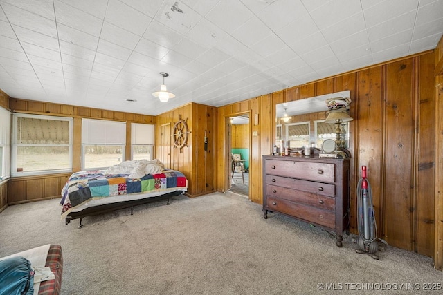 bedroom featuring light colored carpet