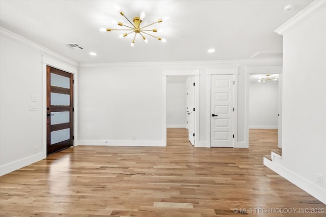 interior space with light wood-type flooring, ornamental molding, and an inviting chandelier