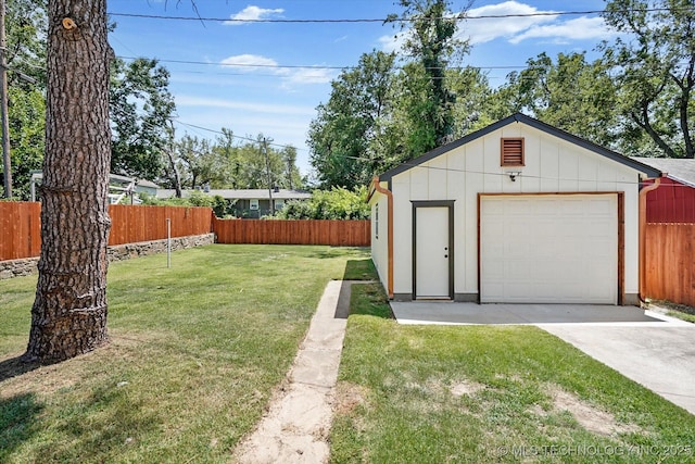 garage with a yard