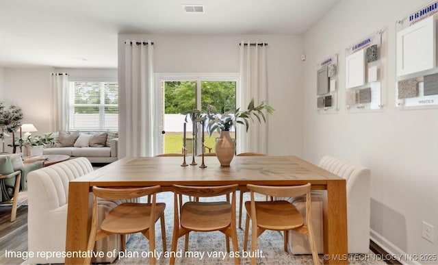 dining area featuring light hardwood / wood-style floors