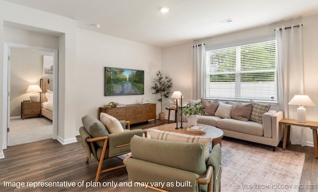 living room with dark hardwood / wood-style flooring