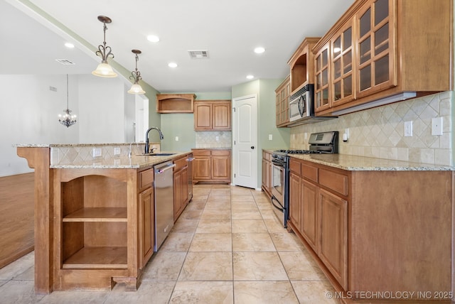 kitchen featuring a sink, visible vents, backsplash, open shelves, and appliances with stainless steel finishes