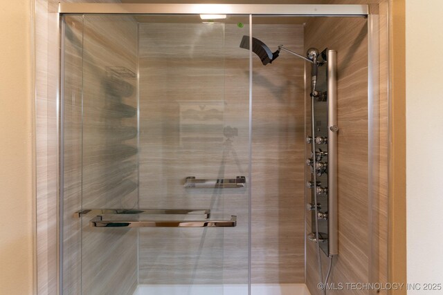 bathroom featuring an enclosed shower