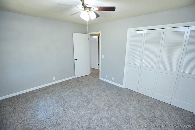 unfurnished bedroom featuring carpet, ceiling fan, and a closet