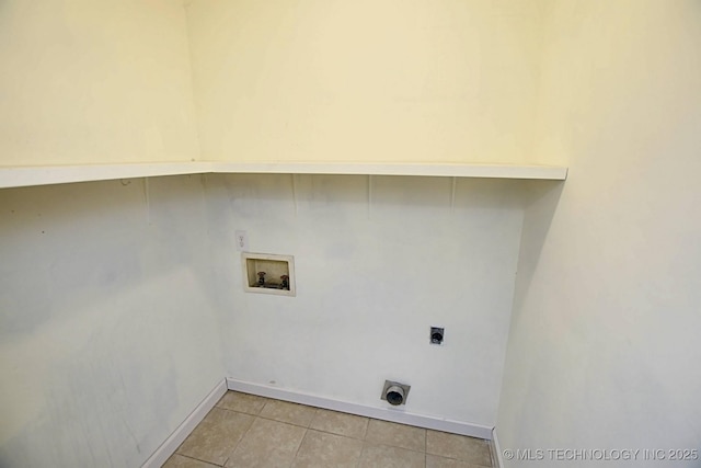 laundry room with hookup for an electric dryer, hookup for a washing machine, and light tile patterned floors