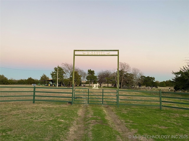 exterior space with a rural view