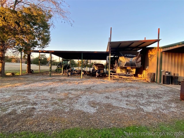 exterior space with a carport