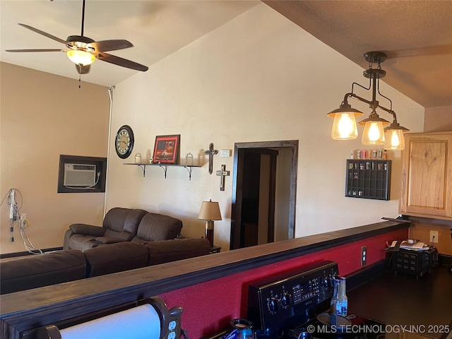 playroom with vaulted ceiling, ceiling fan, and a wall mounted air conditioner