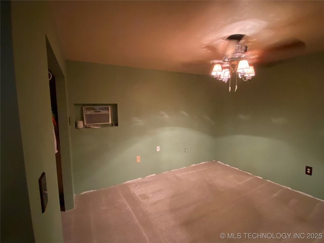 unfurnished room with ceiling fan, carpet floors, and a wall mounted AC