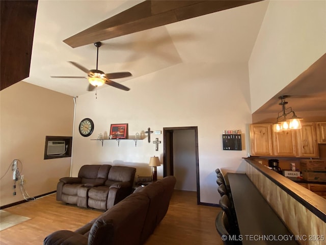 591 Peanut Trl, Hendrix, OK 74741 - living room with high vaulted ceiling, a ceiling fan, dark wood-style floors, and a wall mounted AC