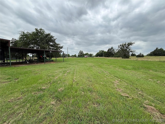591 Peanut Trl, Hendrix, OK 74741 - view of green lawn featuring a rural view