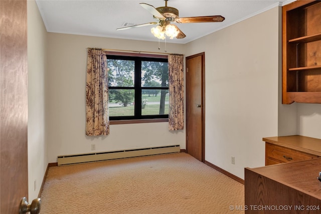 carpeted empty room featuring baseboard heating and ceiling fan