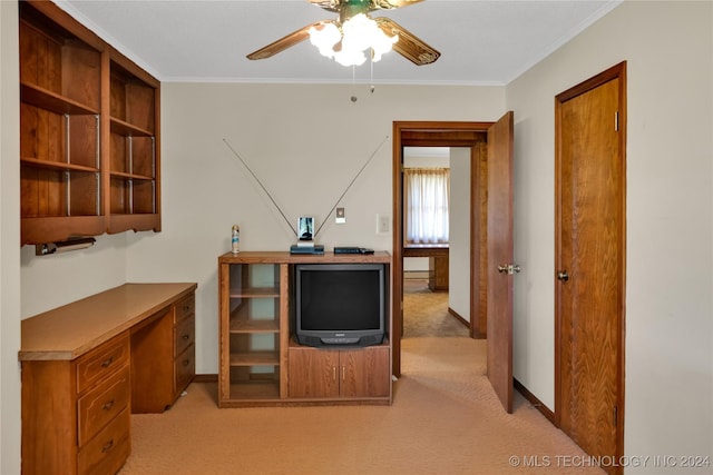 office with ceiling fan, crown molding, and light colored carpet