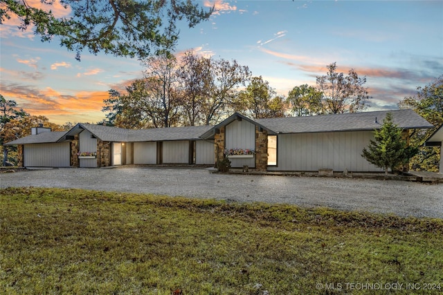 view of front of property with a yard