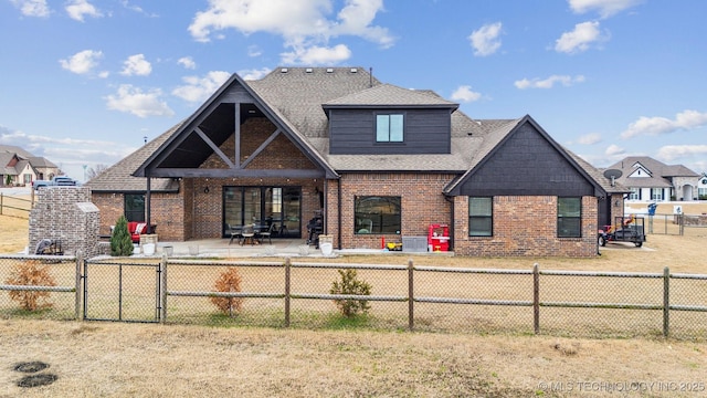 back of property featuring a patio area