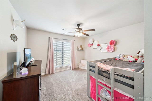 bedroom with light carpet and ceiling fan