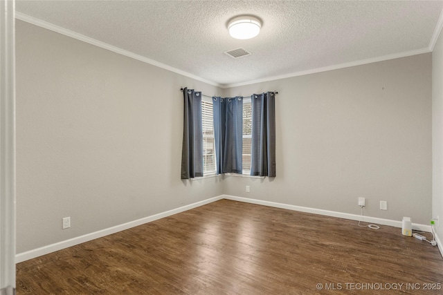 unfurnished room featuring wood-type flooring, a textured ceiling, and crown molding