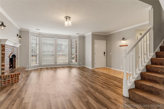 living room with a fireplace, wood-type flooring, and ornamental molding